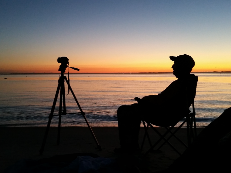Barb Moulinier   enjoying Sunset on the Rehoboth Bay